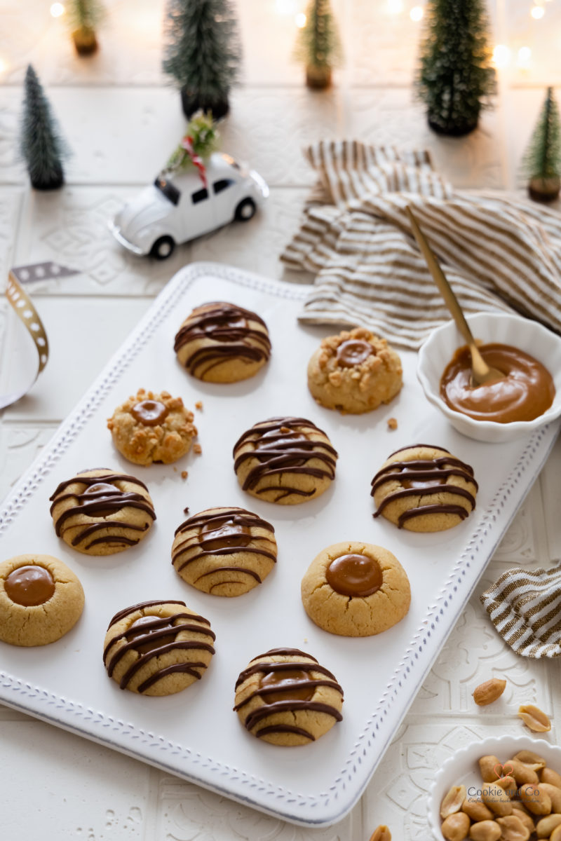Erdnuss Karamell Busserl. Zarter Mürbeteig mit Erdnüssen und Karamell Füllung.